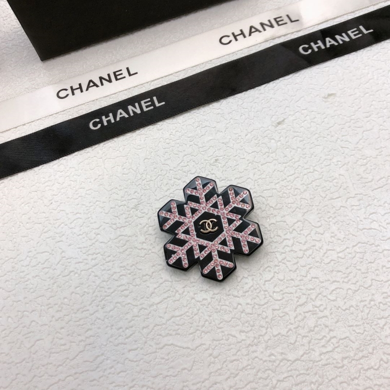 Ch*el brooches